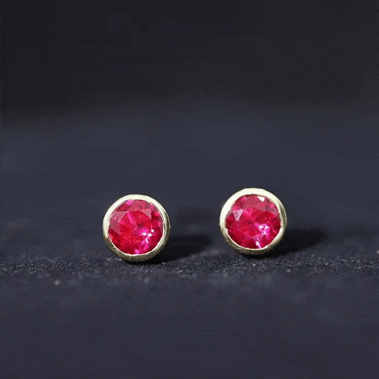 Created Ruby Solitaire Stud Earrings in Bezel Setting